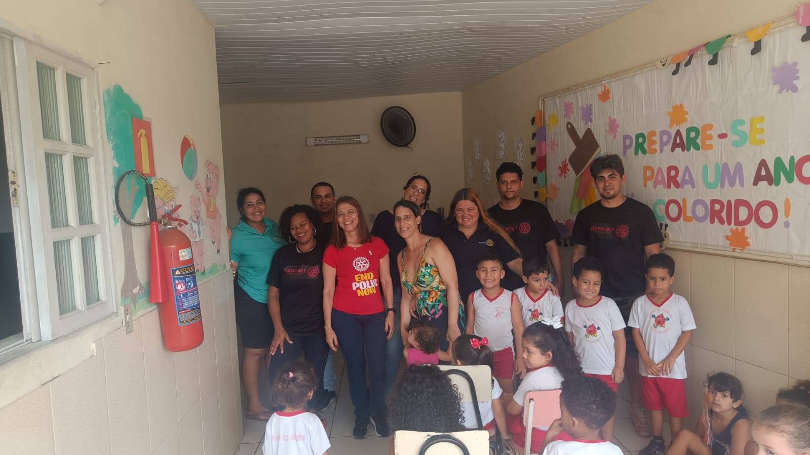 Ação de conscientização junto aos pais e crianças da creche Jardim de Infância Pingo de Gente