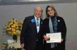 PRESIDENTE LIANE MARIA MENDES MARQUES RECEBENDO O TÍTULO DE COMPANHEIRO PAUL HARRIS E MEDALHA DO REPRESENTANTE DO PRESIDENTE DO ROTARY INTERNACIONAL, HIROSHI SHIMUTA